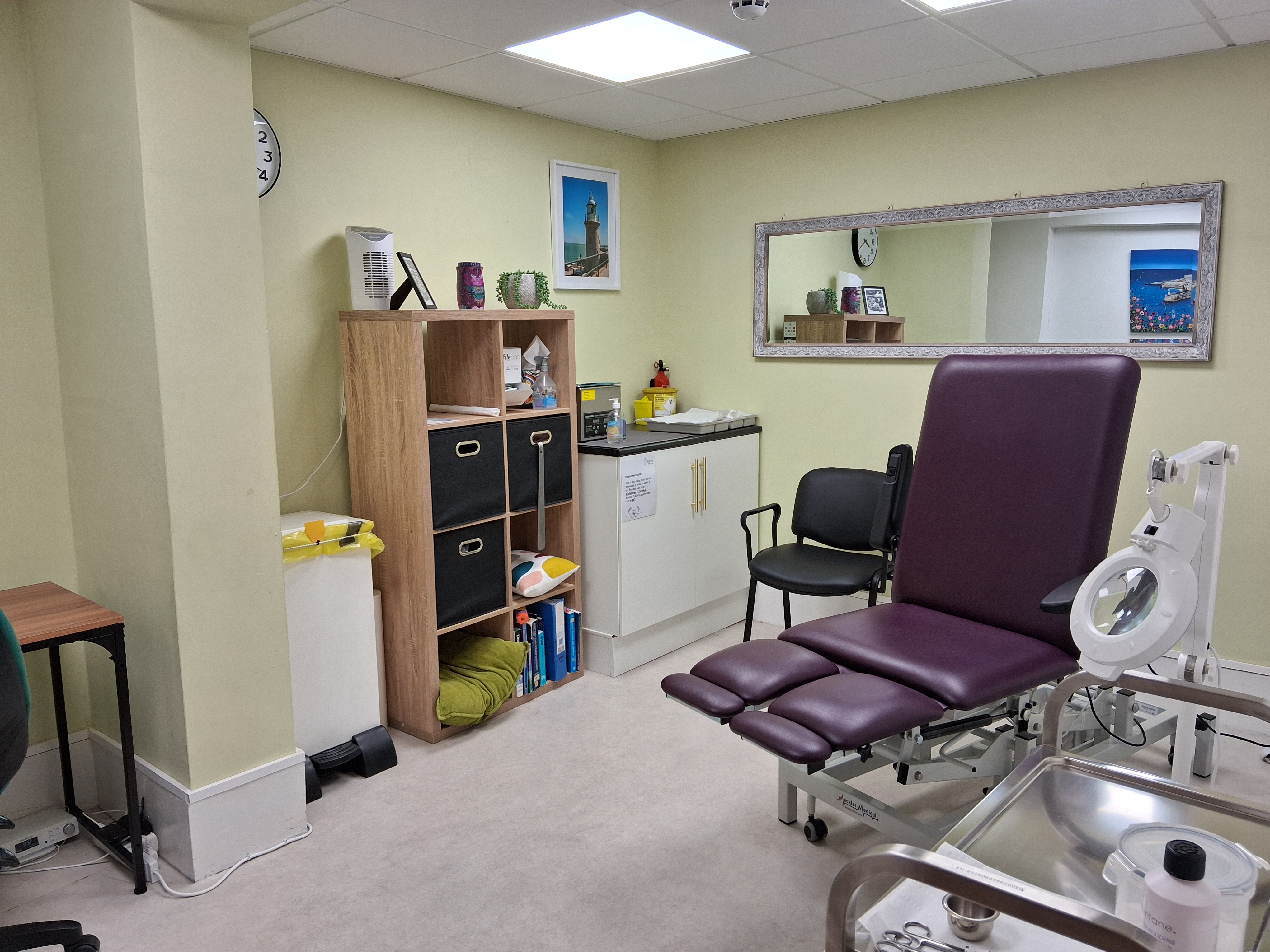 inside view of Earlsgate Podiatry clinic, showing a treatment chair in a brightly lit room